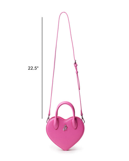 Pink heart-shaped handbag with a stylish handle and adjustable strap, perfect for adding a pop of color to any outfit.