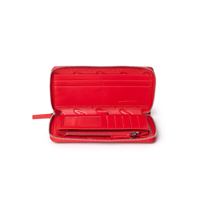 Red leather wallet with multiple card slots, zippered coin pocket, and interior compartments, open to display interior details.