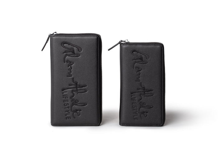 Black zippered wallets with embossed "LIFE STYLE" and "What" text, featuring a sleek, minimalist design.