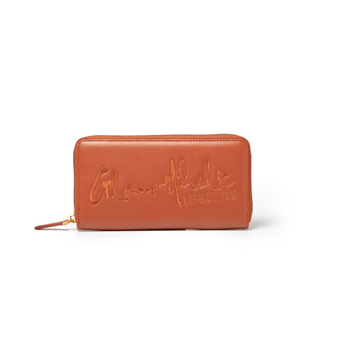 Brown leather wallet with embossed "Glamorous Lifestyle" logo, zip-around closure, and gold-tone zipper pull.