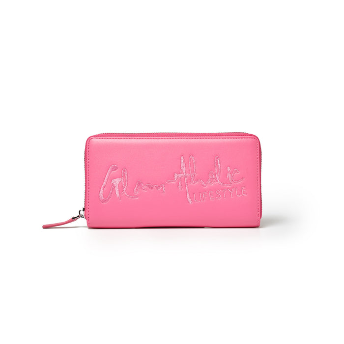 Hot pink wallet with embroidered "Glamatic Lifestyle" logo, zip closure, and sleek rectangular design.