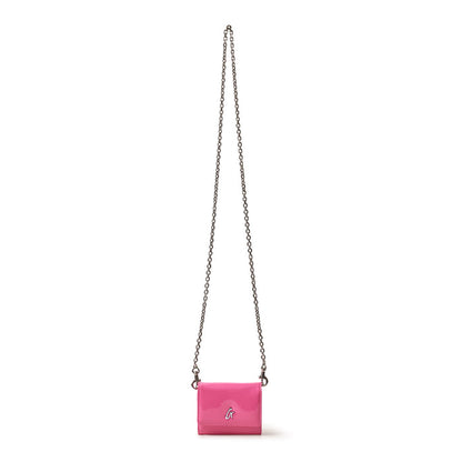 Small pink compact bag with a silver chain strap, silver logo, and a mirror hot pink finish.