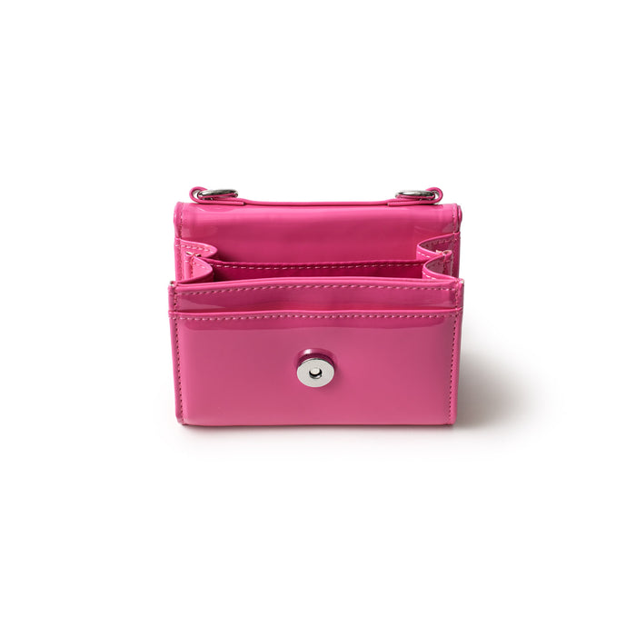 Pink compact wallet with silver hardware, multiple card slots, and a mirror inside, designed for on-the-go use.