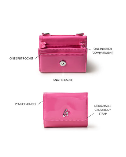 Hot pink compact wallet on chain with snap closure, one interior compartment, and detachable crossbody strap.