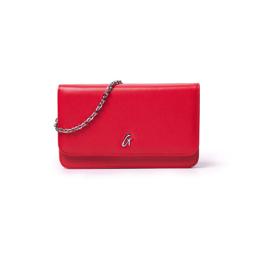 Red leather clutch bag with a silver chain strap and a silver "G" logo on the front.