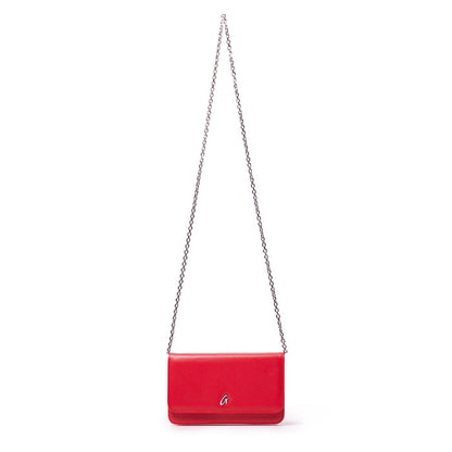 Red leather shoulder bag with a silver chain strap and a silver "G" logo on the front.