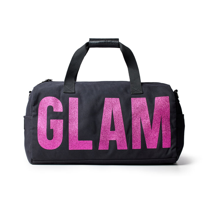Black canvas duffle bag featuring bold pink "GLAM" lettering, perfect for stylish travel and everyday use.