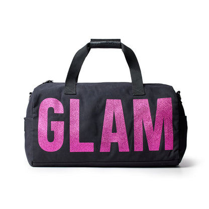 Black canvas duffle bag featuring bold pink "GLAM" lettering, perfect for stylish travel and everyday use.