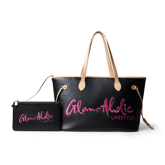 Black and pink tote bag with a stylish logo and matching pouch, perfect for affordable luxury fashion.