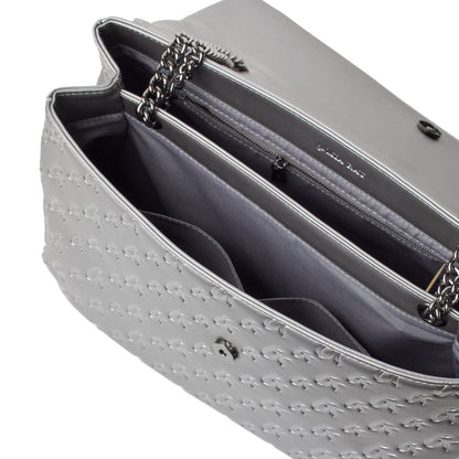 Open XL Monogram Flap Bag in platinum with chain strap, interior compartments, zip pocket, and embossed exterior design.