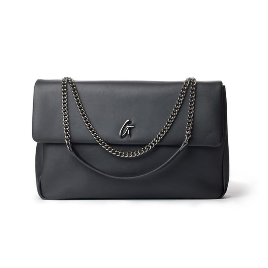 Black XL standard flap bag with chain straps and a metal logo on the front.