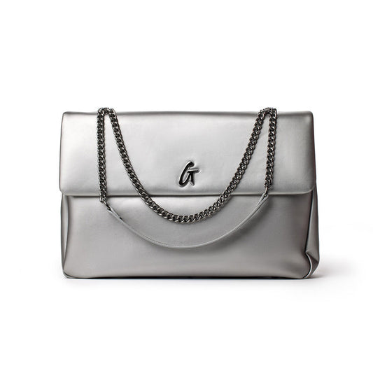 Large platinum-colored flap bag with chain straps and a metallic "G" logo on the front.