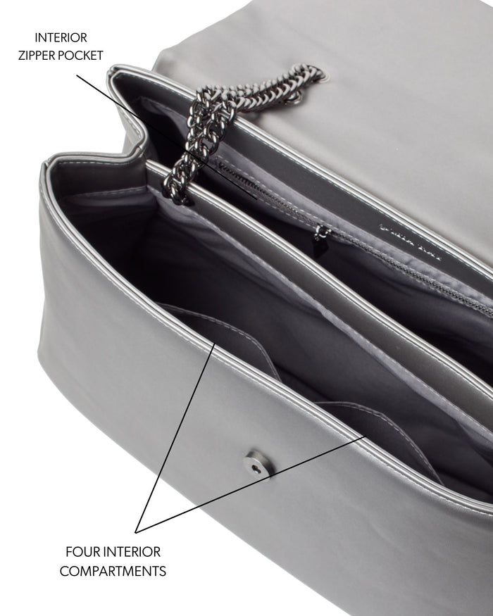 XL Standard Flap Bag in Platinum featuring a sleek design, four interior compartments, and a zipper pocket for organization.