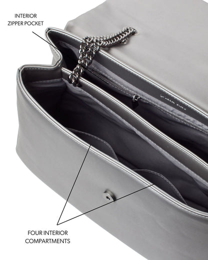 XL Standard Flap Bag in Platinum featuring a sleek design, four interior compartments, and a zipper pocket for organization.
