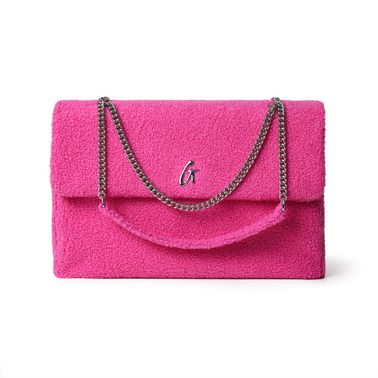 Large hot pink teddy flap bag with a silver chain strap and a metal "G" logo on the front.