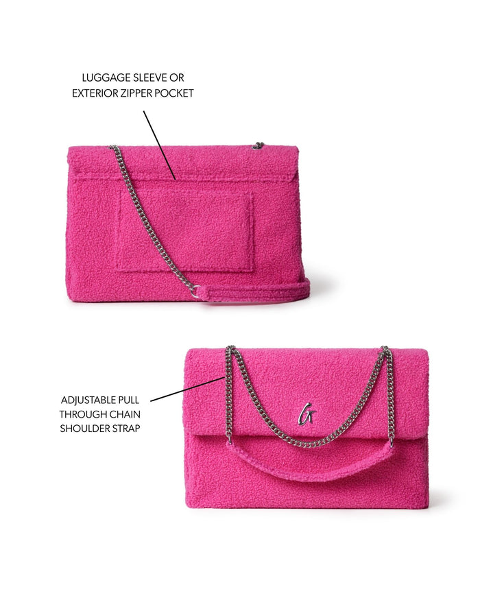 Hot pink XL Teddy flap bag featuring a luggage sleeve, exterior zipper pocket, and adjustable chain shoulder strap.