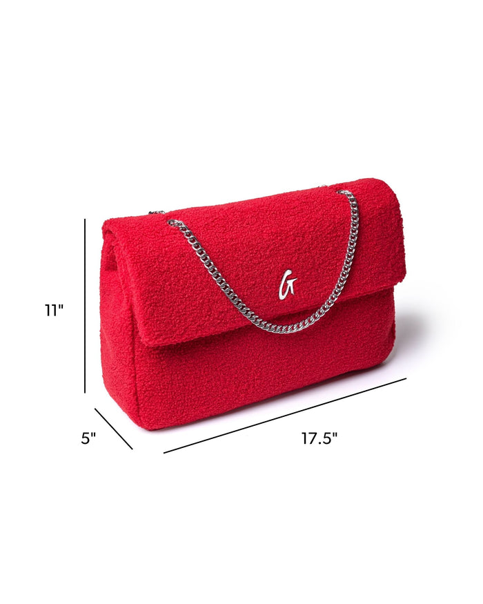 XL Teddy flap bag in red with a plush texture, featuring a silver chain strap and a stylish flap closure.