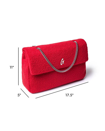 XL Teddy flap bag in red with a plush texture, featuring a silver chain strap and a stylish flap closure.
